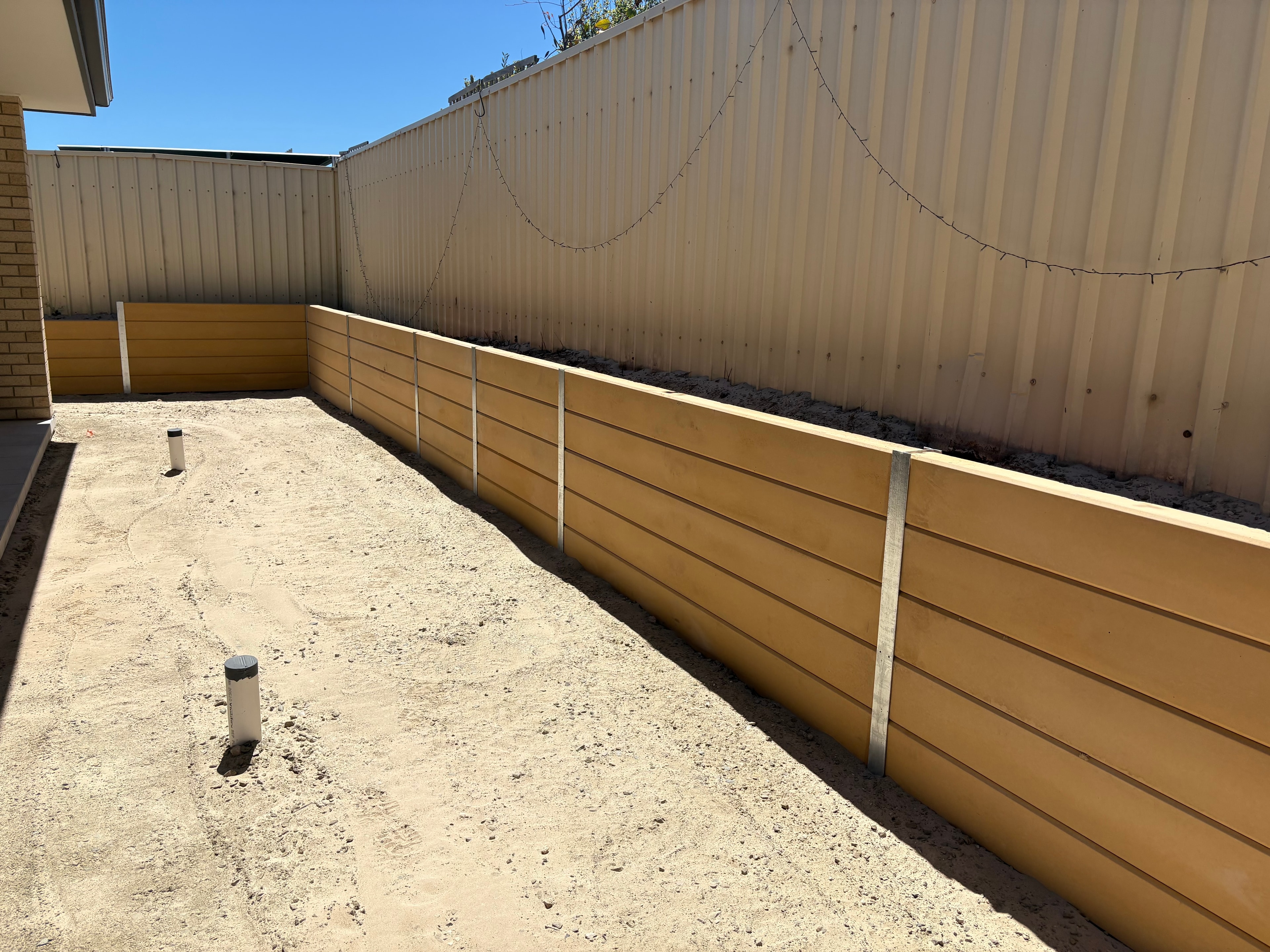 Landscaping and retaining wall